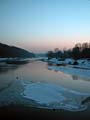river Isar through Munich, frosty pinkblue sunset view in winter 